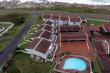 Aerial view complex with pool and undercover parking