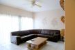 Spacious lounge with quality leather furniture