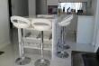 Bar stools around kitchen island - Self Catering Apartment Accommodation in Umhlanga Rocks