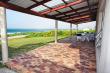 Lovely large veranda overlooking the beach and surfing areas