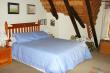 Upstairs bedroom en-suite  - Self Catering Cottage Accommodation in Central Drakensberg
