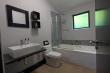 Upstairs rooms have en-suite bath / shower combination