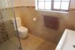 Bathroom groundfloor cottage with showercubicle,toilet and washbasin