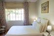 Sugarlands Cottage | Bedroom with Queen bed.