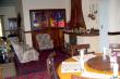 Sitting room with a fireplace - Bethal Star Graded Guest House Accommodation
