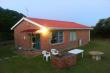 Side view of the cottage with quiet and private braai area