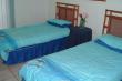 Second bedroom with two single beds - - unit 61