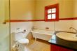 Stand-alone bathroom with shower, bath, toilet and basin