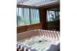 Penthouse jacuzzi with retractable roof for star gazing or sun tanning.