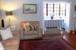 Lounge with sun room in the back - Self Catering Cottage Accommodation in Ramsgate, South Coast