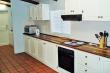 Kitchen has a scullery with dishwasher, washing machine and drier
