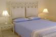 Main bedroom with bathroom en suite - Self Catering Apartment Accommodation in Ballito