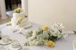 Ninety North arranges wedding cake, flowers etc