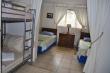 Family bedroom with 1 single, 1 double, and bunk beds (bunks suitable for kids only). BIC