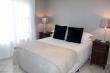 Bedroom 1 with double bed - white linen