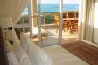 Main Bedroom with sea view - Self Catering Apartment Accommodation in Shelly Beach