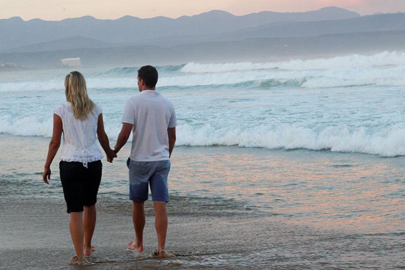 Couple walking on the beach