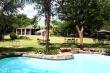 Poolside looking toward restaurant - Bulawayo/Matopos Catered Bush Lodge Accommodation