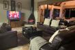 Living area with flatscreen DSTV and fireplace 