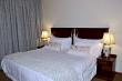 Black Grouse main bedroom, crisp clean linen, generously decorated bedrooms