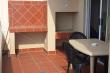 Built-in braai on balcony - Self Catering Apartment Accommodation in Amanzimtoti