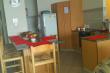 Open plan fully equipped kitchen - Self Catering Apartment Accommodation in Amanzimtoti