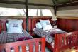 Deck Room: Sleeps two on teak framed 3/4 beds