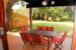 Patio overlooking gardens (built in braai) - Self Catering Holiday Accommodation in San Lameer