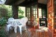 Milkwood Cottage offers various seating areas from which to enjoy the peaceful greenery and large ga