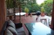 Villa 2411 covered patio /outdoor dining - San Lameer Self Catering Holiday Accommodation