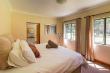 Master bedroom with en-suite bathroom in Forest Cottage