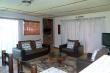 Zebra - lounge with indoor braai / fireplace
