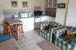 Unit D.D.D kitchenette & lounge with “cosy” fireplace