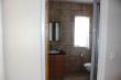 Second bathroom with shower, basin and toilet