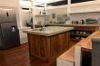 Open plan kitchen with centre island fully equipped for 10 people