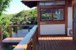 Private free standing individual bedrooms interlinked with a wooden walkway