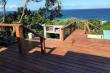 Open fire braai/barbeque next to the pool with stunning sea view. Mega Master gas braai available 