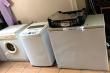 laundry with toploader, tumbledrier and inside wash area