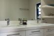 En-suite bathroom with complementary hand wash & cream 