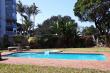 POOL WITH TABLES AND BRAAI AREA