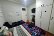 Purple room with double and single bed, TV with Netflix 