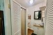 Family cottage bathroom with shower and toilet and basin