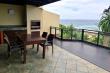 Outdoor dining area and braai with uninterrupted sea views 