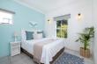 3rd Bedroom with garden views & comfy queen-size bed