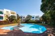 Fun filled and sun drenched communal pool next to unit